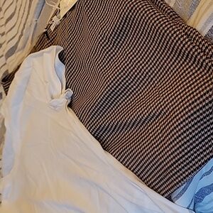 Mini skirt with body suite. New with tags. Size M shirt and L skirt